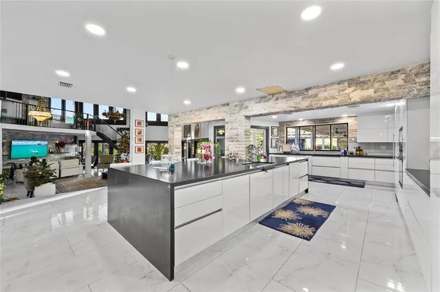 a bedroom with bed and a couch