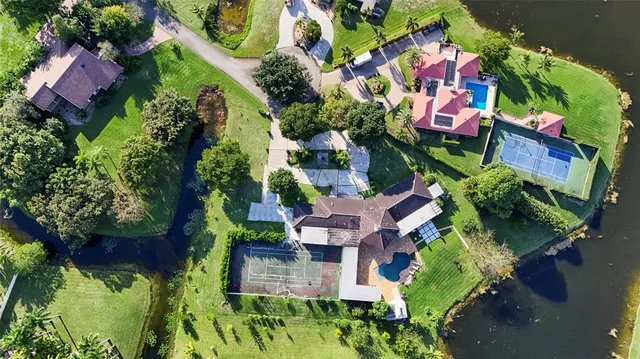 a view of a kitchen with dining table and chairs