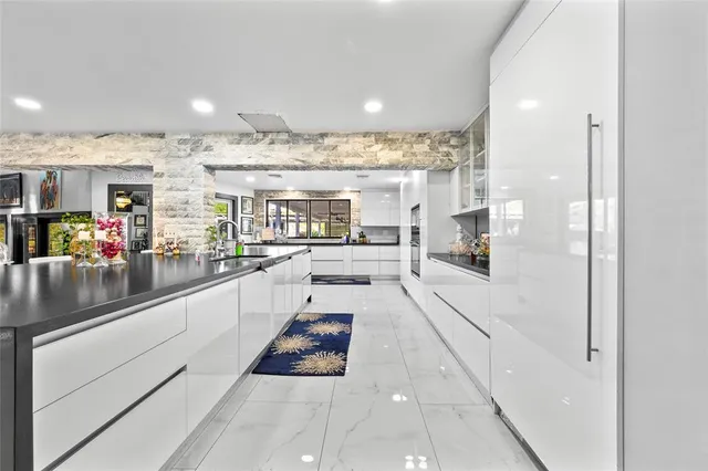 a view of living room and kitchen with furniture
