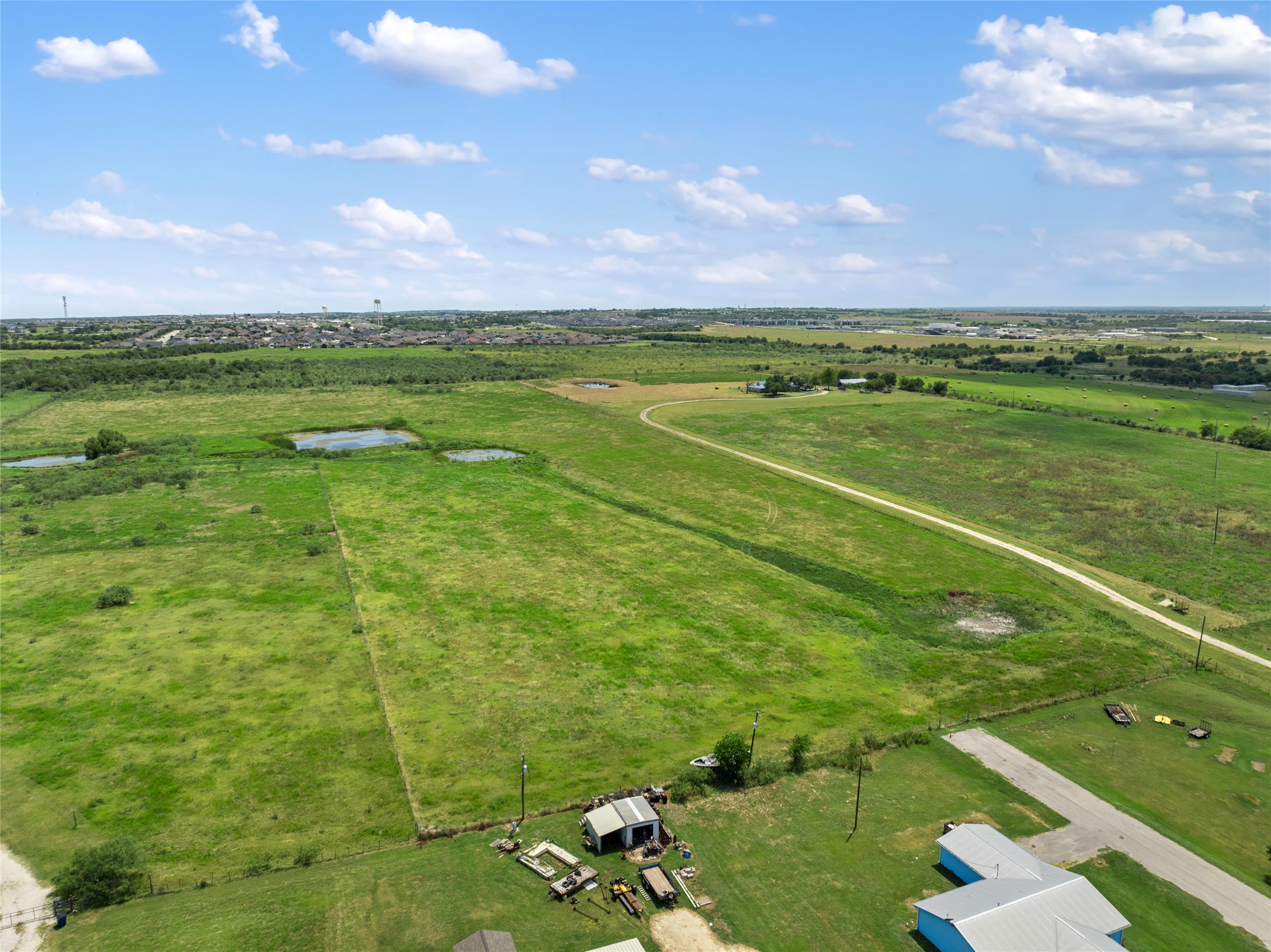 1775 County Road 305 Jarrell, TX 76537 - Photo 10 of 11 Overview of rural landscape with a large body of water