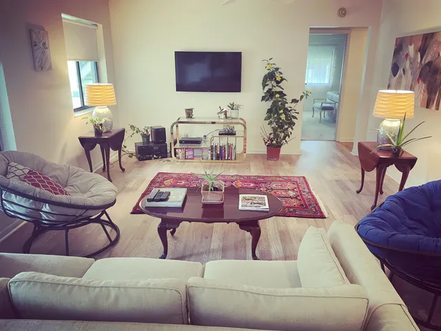 a living room with furniture and a couch