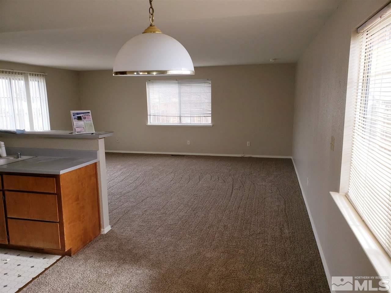 536 Yellow Jacket Road Dayton, NV 89403 - Photo 3 of 7 an empty room with windows
