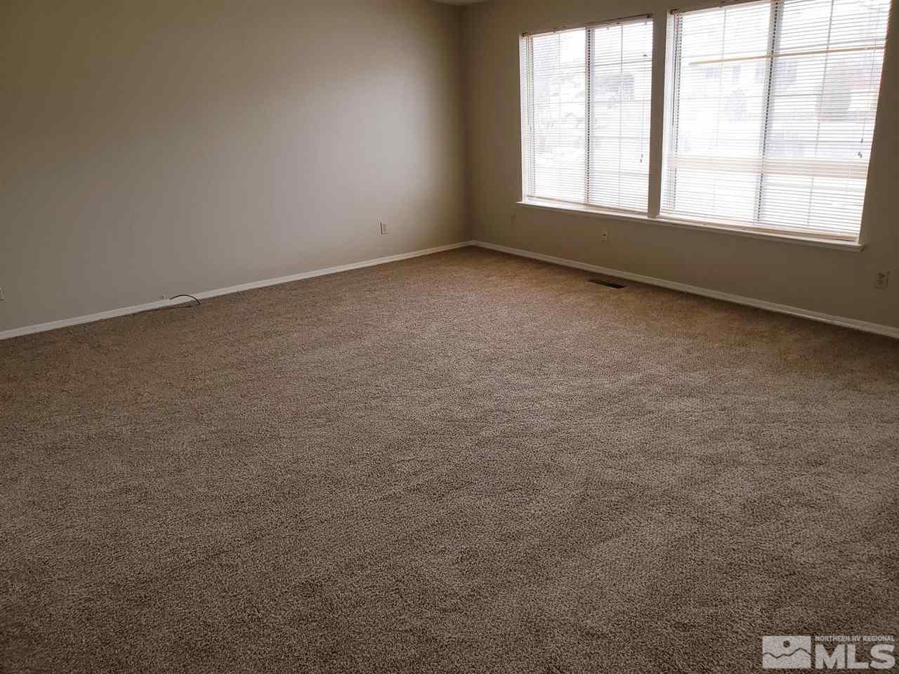 536 Yellow Jacket Road Dayton, NV 89403 - Photo 5 of 7 an empty room with a window