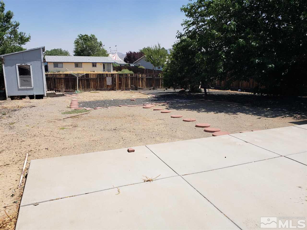 536 Yellow Jacket Road Dayton, NV 89403 - Photo 7 of 7 a front view of a house with a yard
