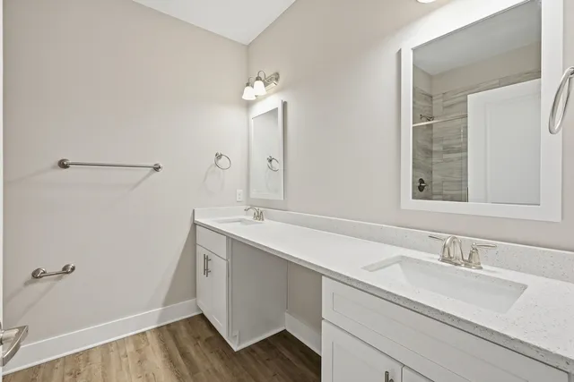 a bathroom with a sink and a mirror