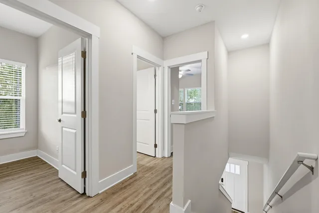 a view of entryway with wooden floor