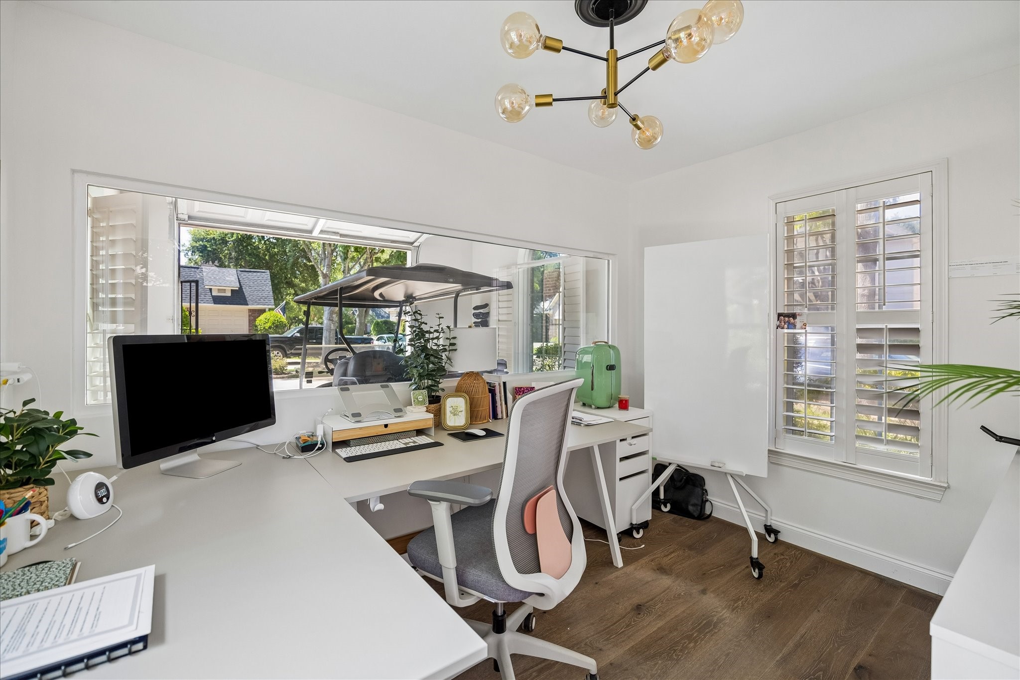 11411 Gallant Ridge Lane Houston, TX 77082 - Photo 23 of 27 1-car detached garage redesigned to host a comfortable yet modern and functional office of ~110 sq.ft. Fully air-conditioned. Windows on each side make the place perfect for productivity and inspiration.