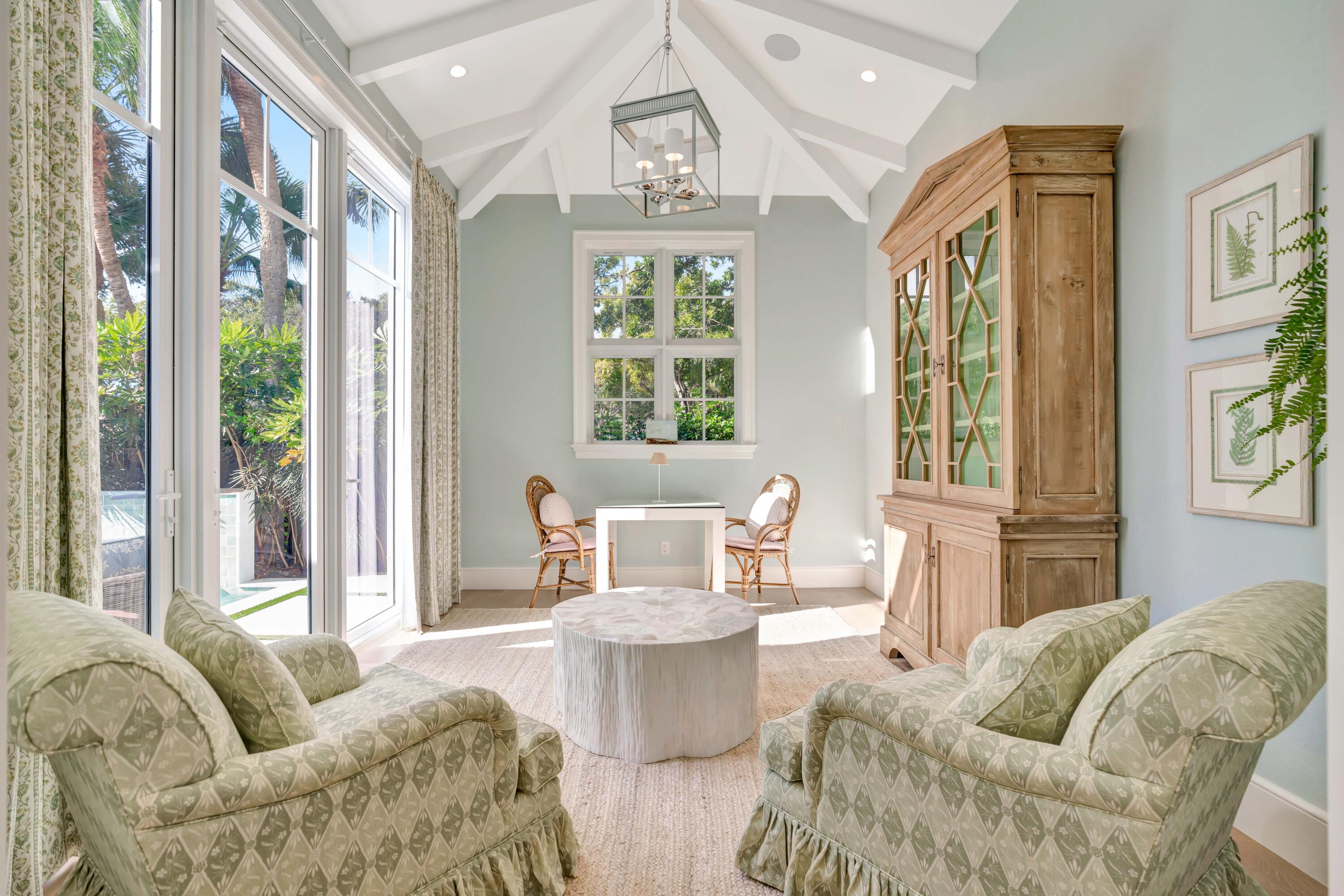 185 Birkdale Lane Jupiter, FL 33458 - Photo 22 of 64 a living room with furniture and a large window