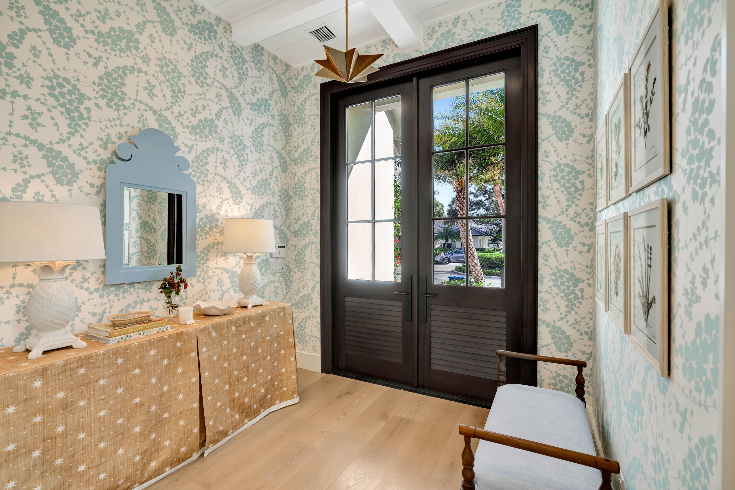 185 Birkdale Lane Jupiter, FL 33458 - Photo 3 of 64 a bathroom with a sink mirror and a bathtub