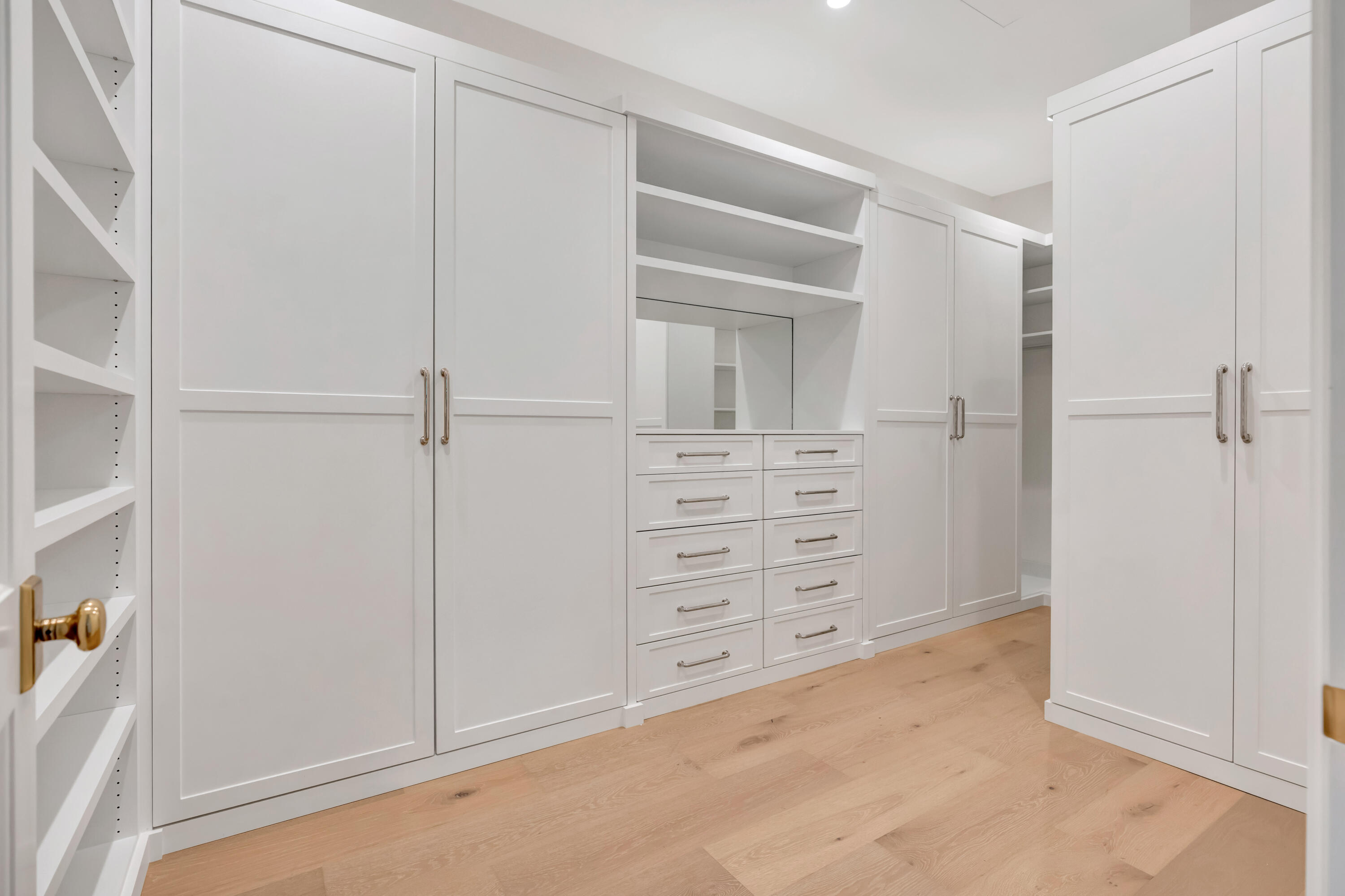 185 Birkdale Lane Jupiter, FL 33458 - Photo 31 of 64 a view of walk in closet with empty racks