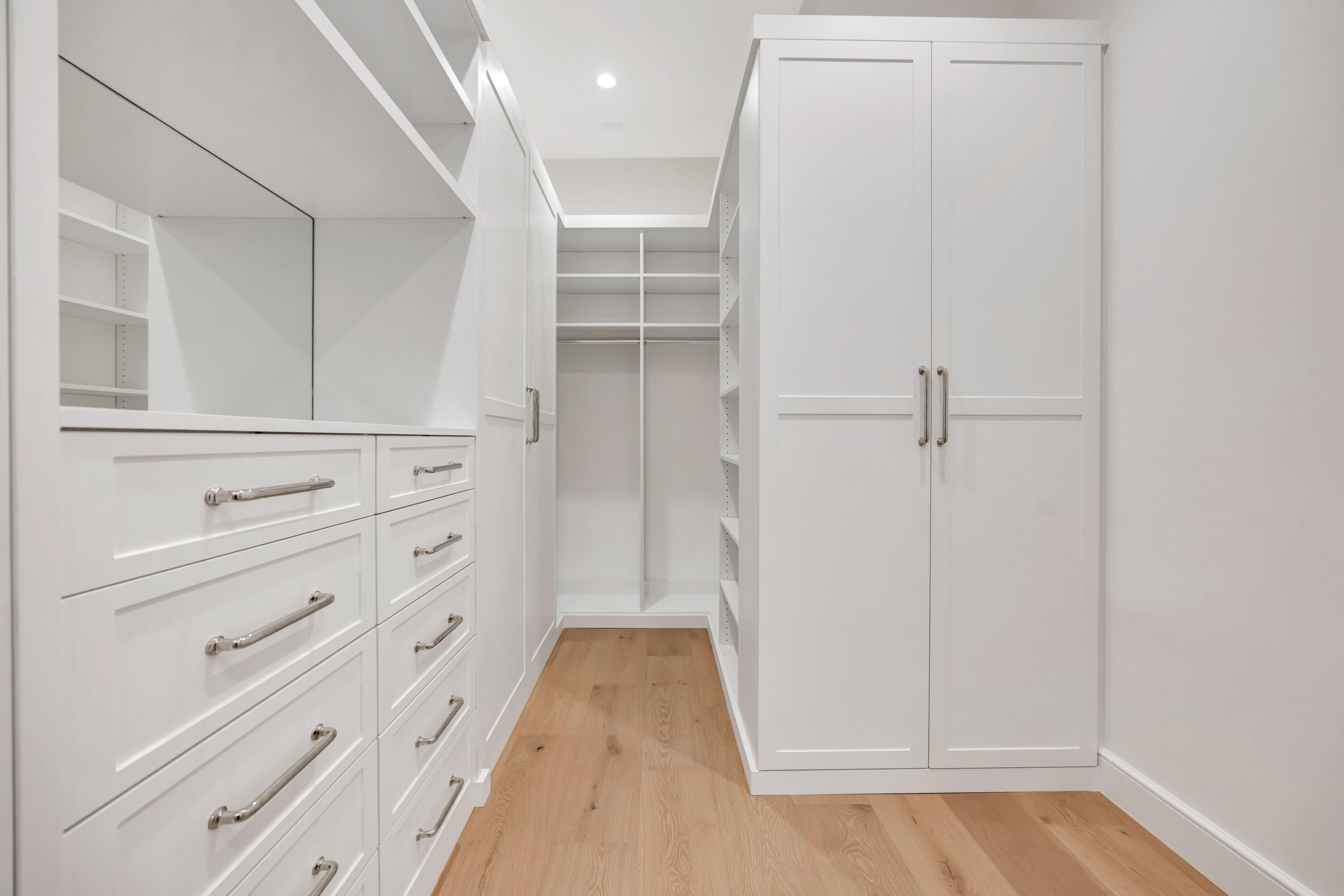 185 Birkdale Lane Jupiter, FL 33458 - Photo 32 of 64 a view of walk in closet with cabinet and floor to ceiling window