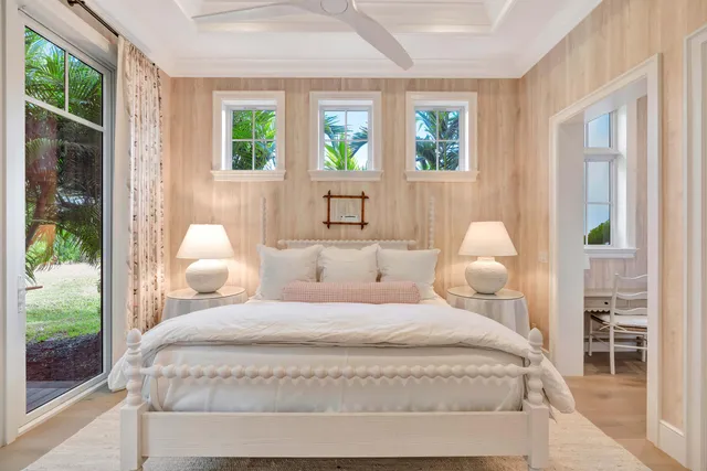a bathroom with a double vanity sink mirror and shower