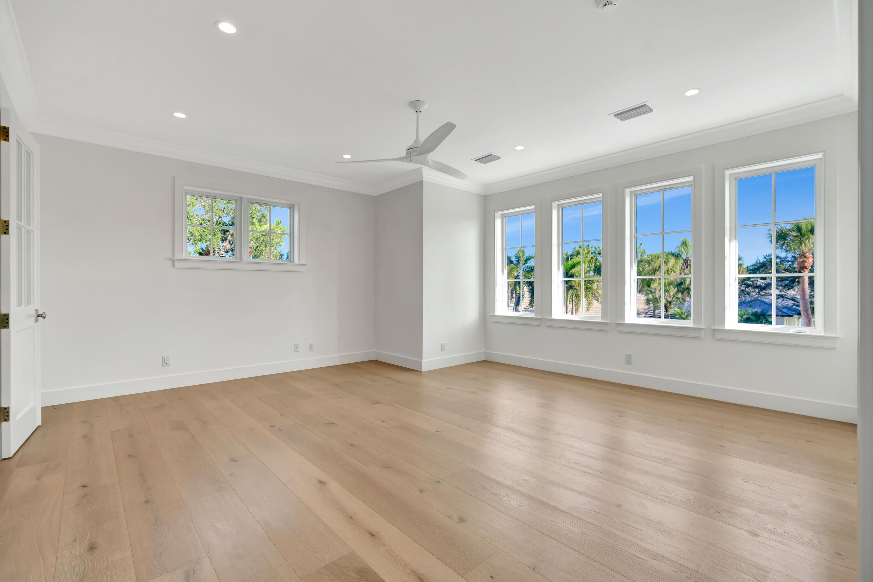 185 Birkdale Lane Jupiter, FL 33458 - Photo 43 of 64 wooden floor in an empty room with a window