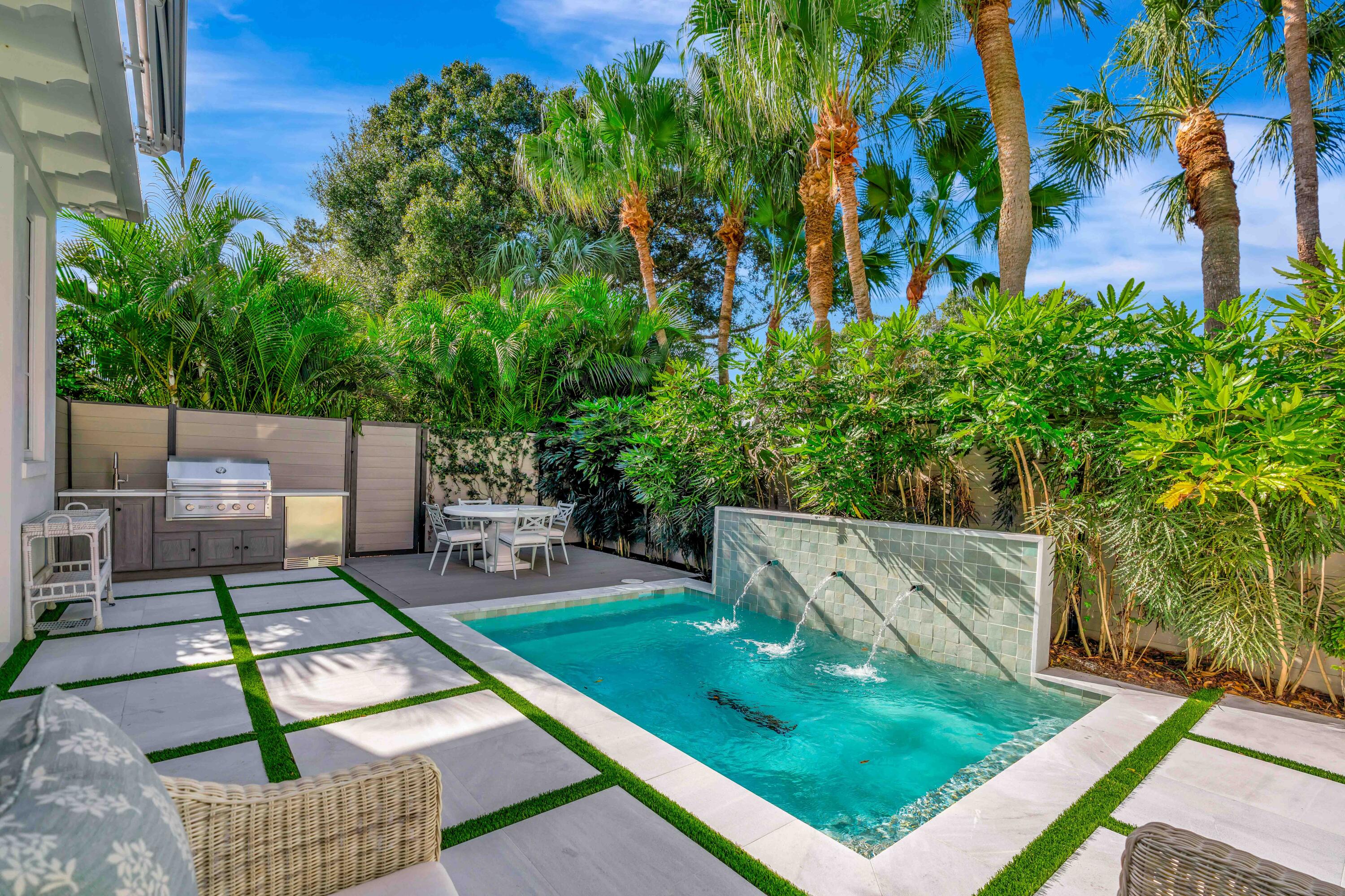 185 Birkdale Lane Jupiter, FL 33458 - Photo 58 of 64 swimming pool view with a seating space