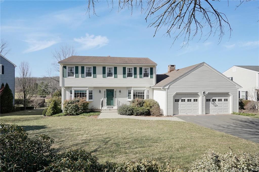 91 Lazy Brook Road Monroe, CT 06468 - Photo 1 of 1 a front view of a house with a garden