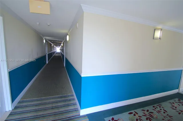 a bathroom with a shower and a door