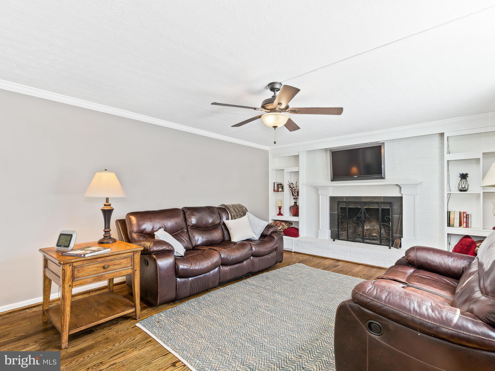 8017 Treasure Tree Court Springfield, VA 22153 - Photo 11 of 29 Family Room with wood burning fireplace
