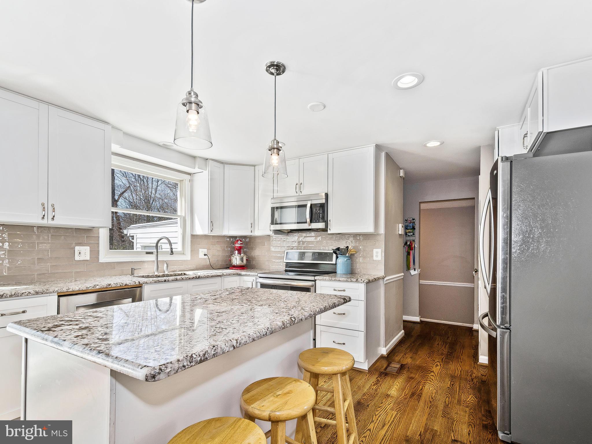 8017 Treasure Tree Court Springfield, VA 22153 - Photo 4 of 29 Kitchen with Upgraded Granite