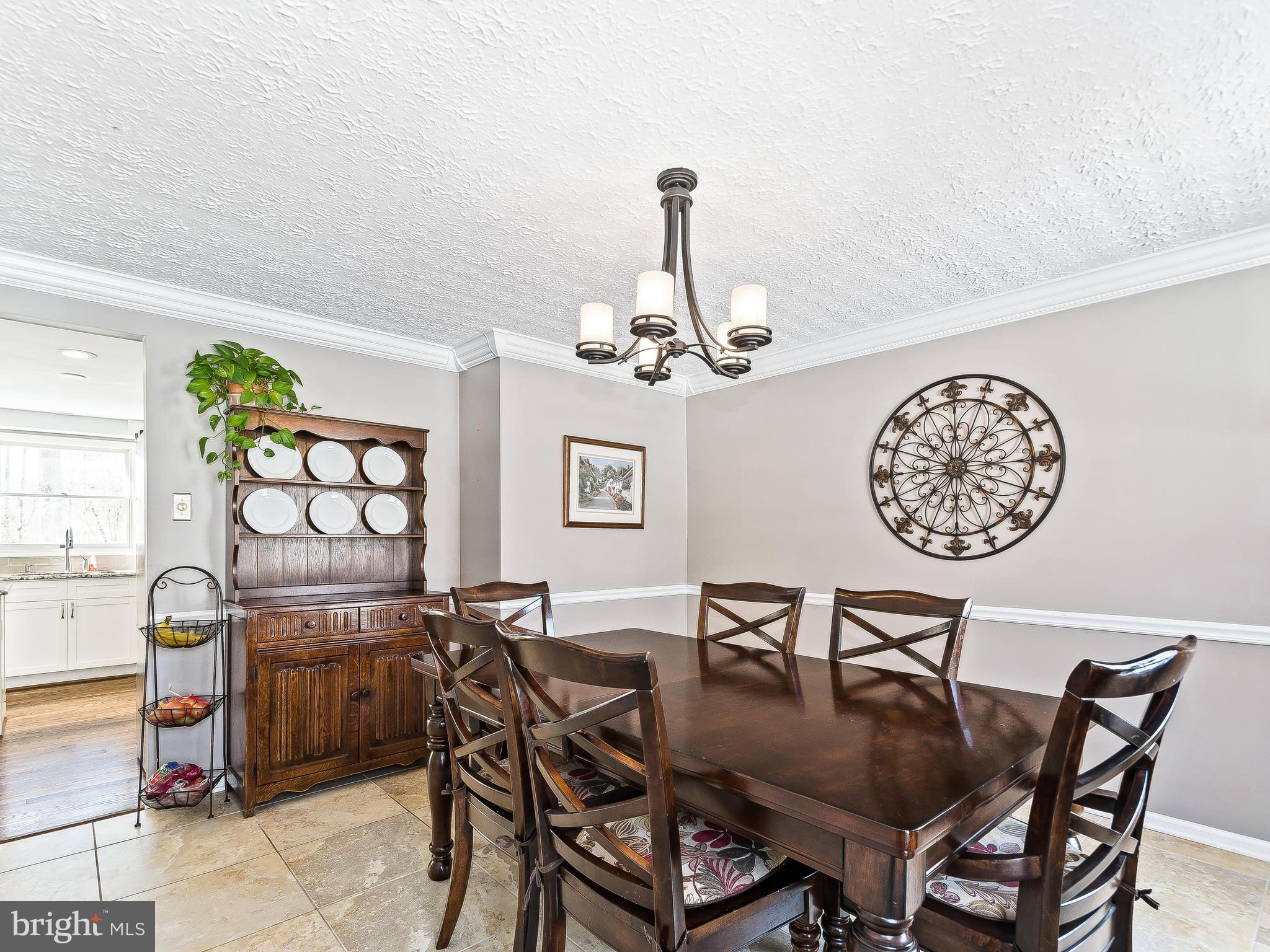 8017 Treasure Tree Court Springfield, VA 22153 - Photo 8 of 29 Dining Room with updated light fixtures