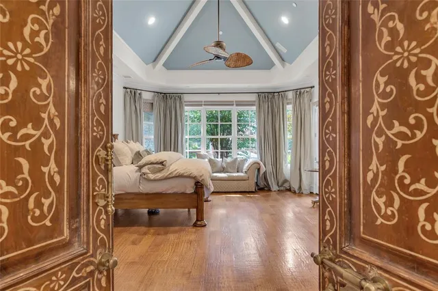 a room with furniture and a large window