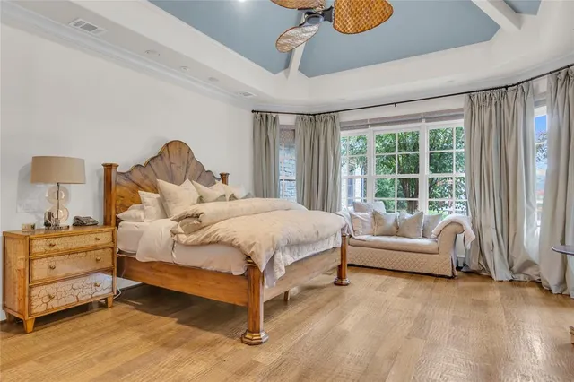 a view of a room with a table and chairs