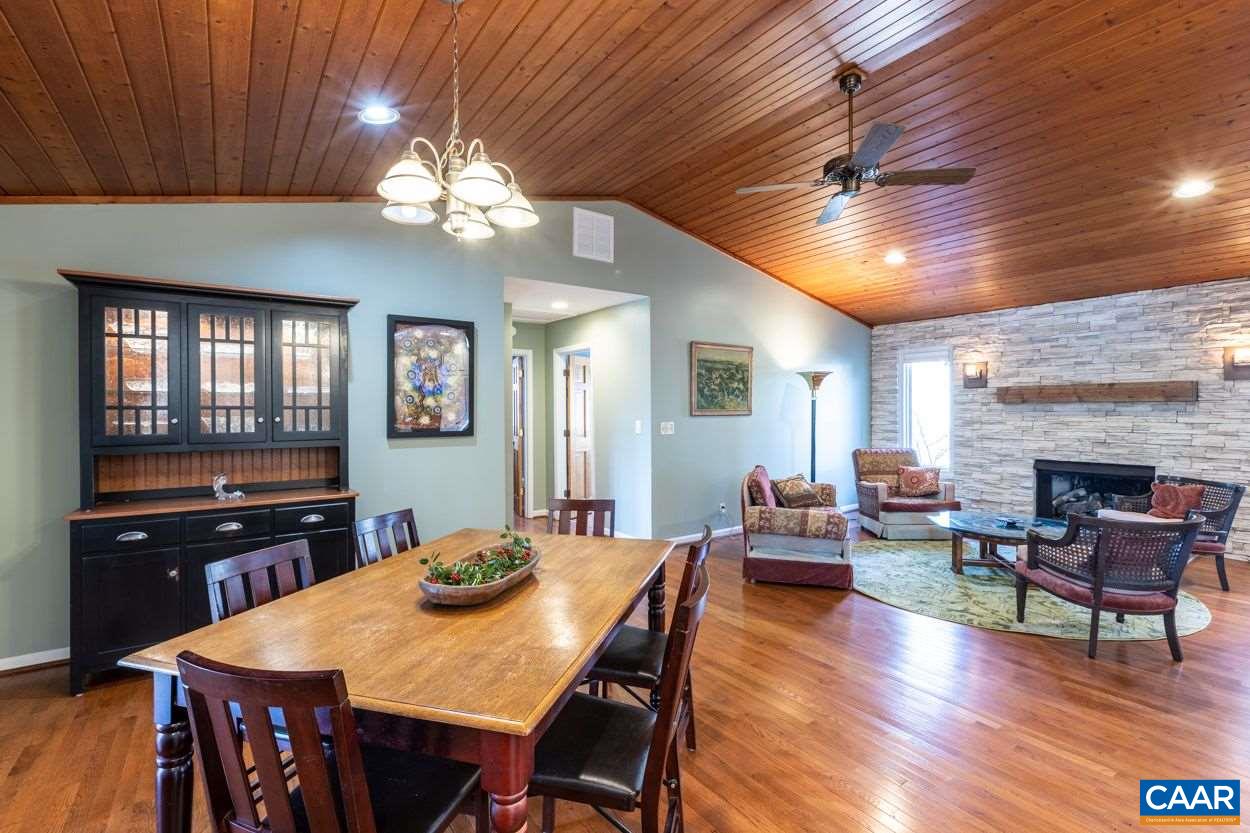 28 Colonial Road Palmyra, VA 22963 - Photo 11 of 40 a view of a dining room with furniture a chandelier and wooden floor