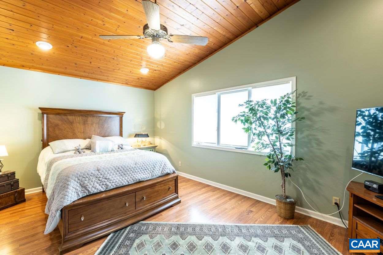 28 Colonial Road Palmyra, VA 22963 - Photo 18 of 40 a bedroom with a bed and a window