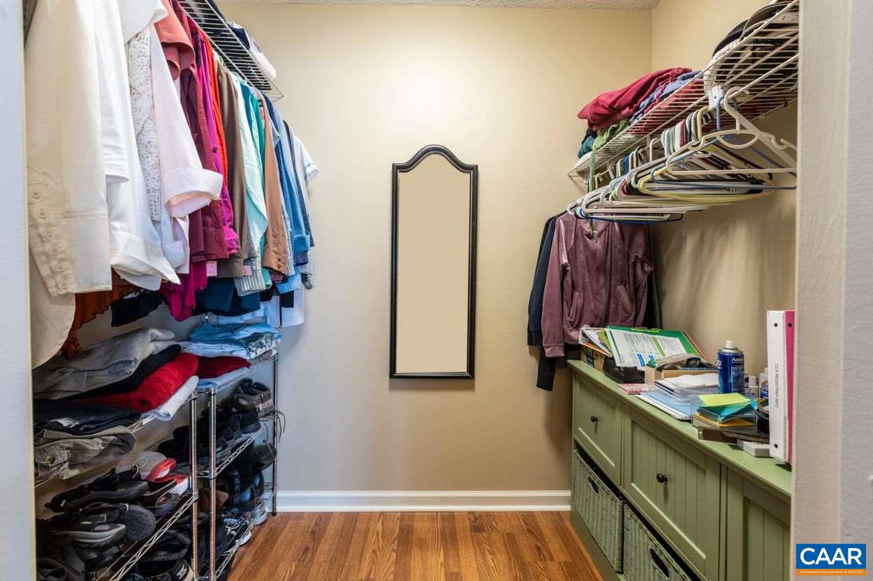 28 Colonial Road Palmyra, VA 22963 - Photo 23 of 40 a view of walk in closet with clothes and shoes