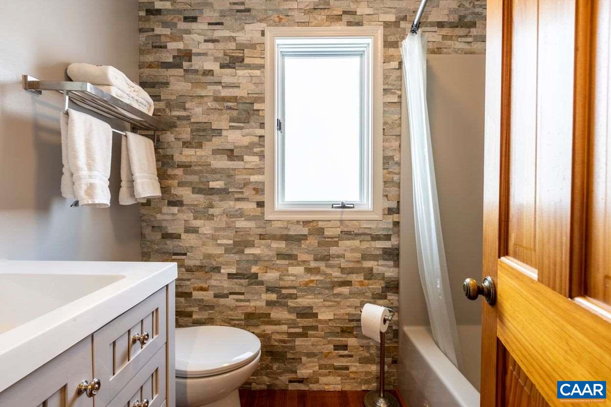 28 Colonial Road Palmyra, VA 22963 - Photo 27 of 40 a bathroom with a sink and a toilet