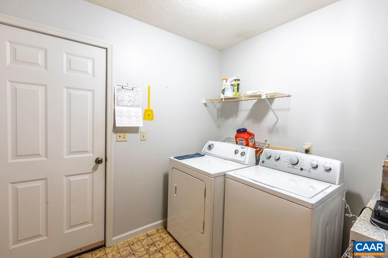 28 Colonial Road Palmyra, VA 22963 - Photo 30 of 40 a utility room with dryer and washer