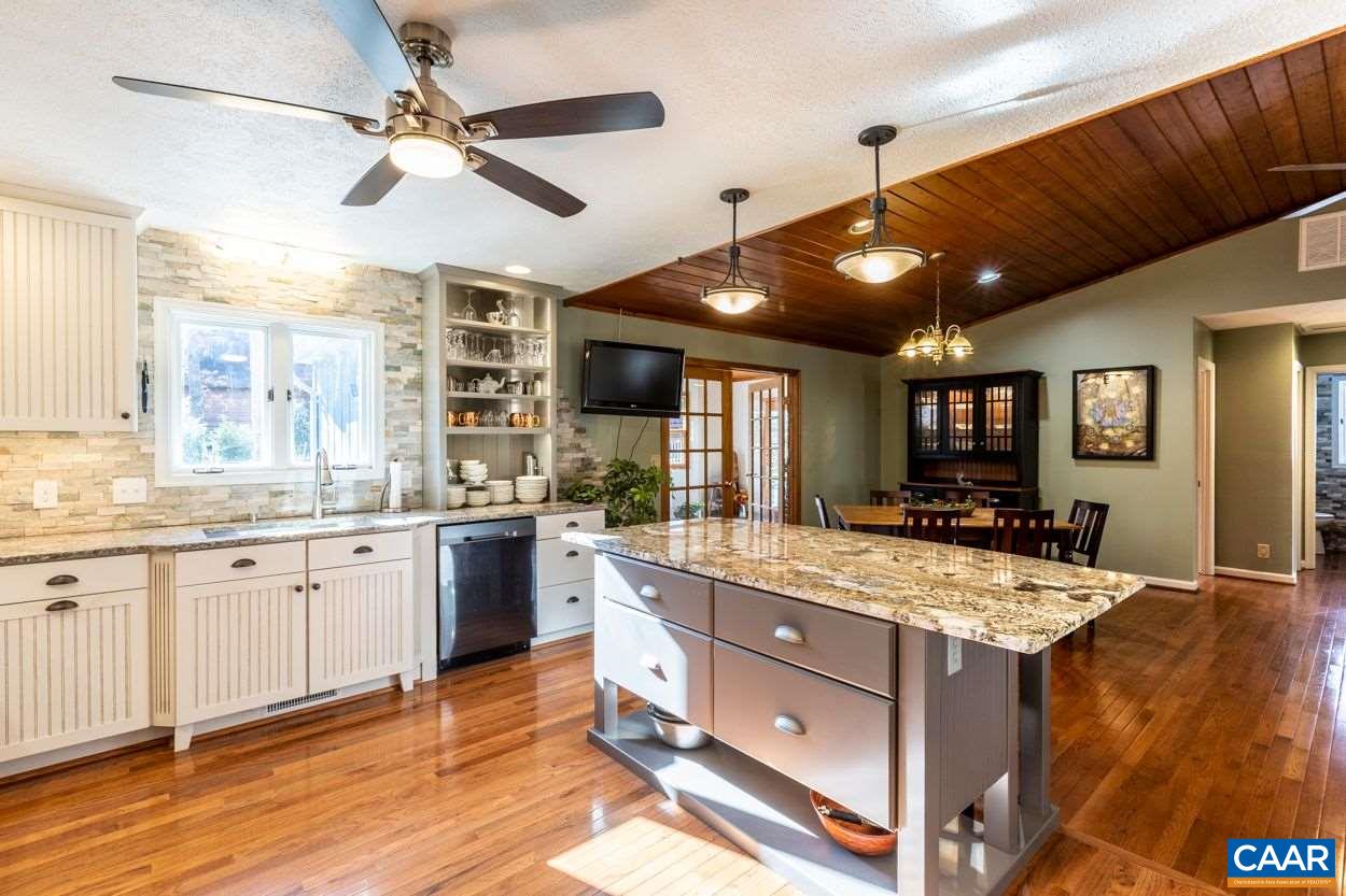 28 Colonial Road Palmyra, VA 22963 - Photo 3 of 40 a large kitchen with kitchen island a large counter space appliances and cabinets