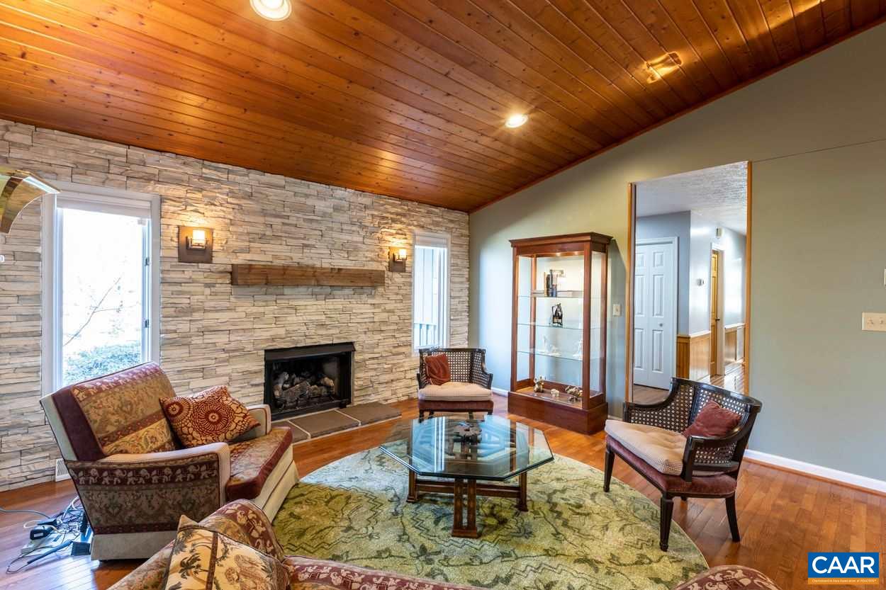 28 Colonial Road Palmyra, VA 22963 - Photo 10 of 40 a living room with furniture and a fireplace