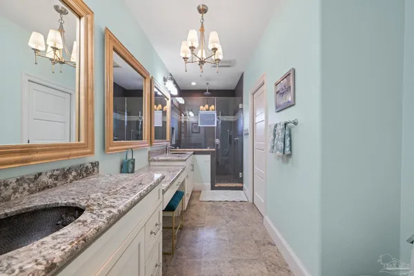 a utility room with sink dryer and washer