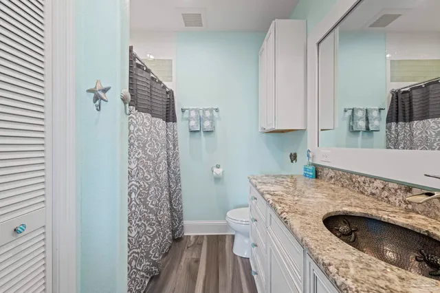 a workspace with furniture and wooden floor