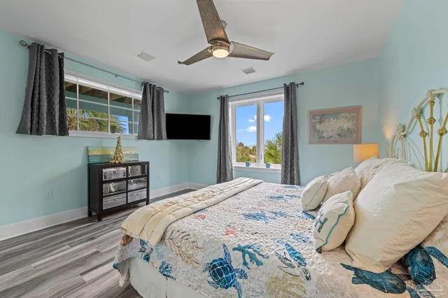 a view of a swimming pool with chairs