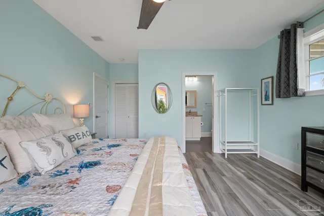 a view of a patio with table and chairs and potted plants