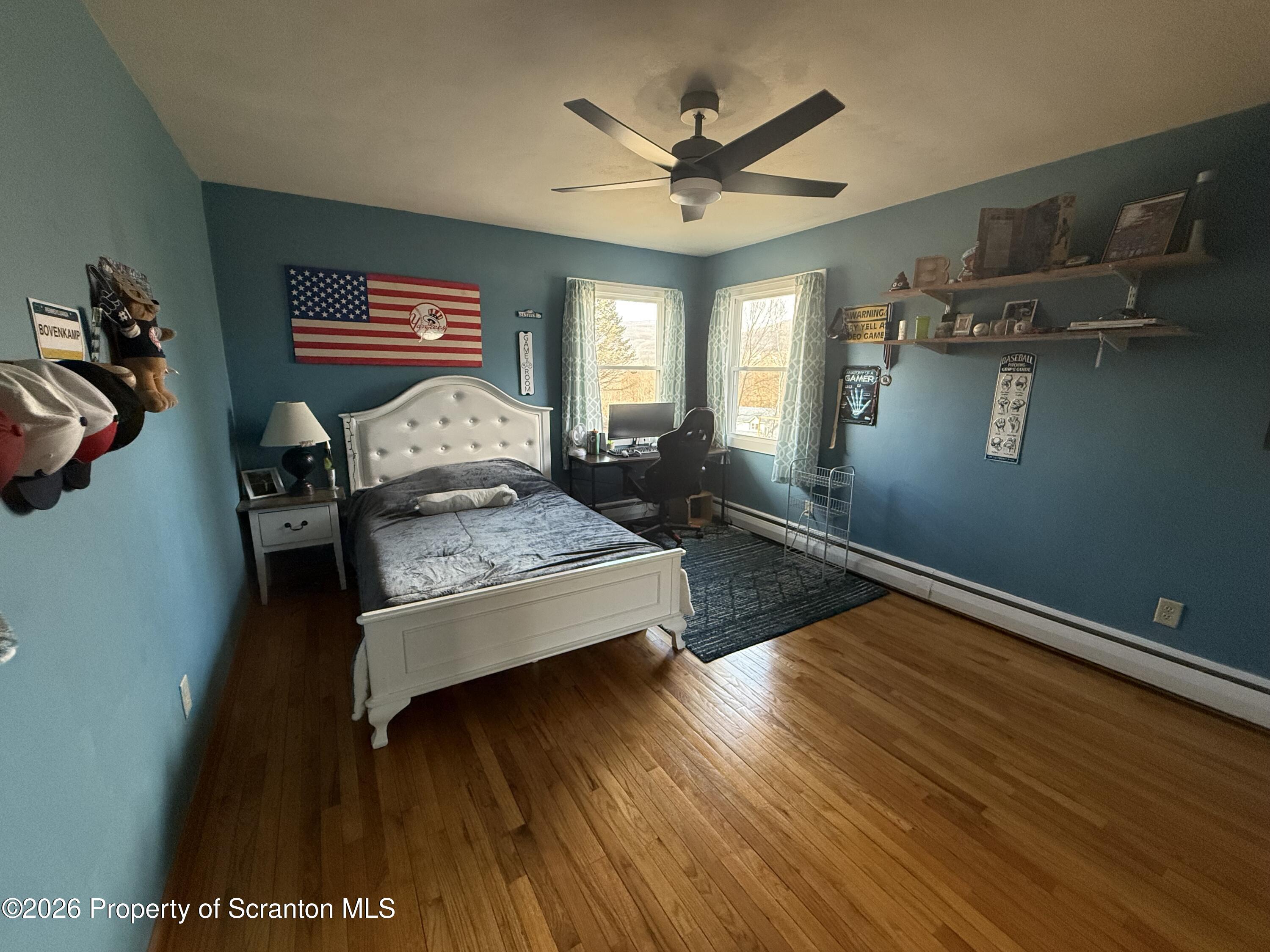 760 North Valley Avenue Olyphant, PA 18447 - Photo 11 of 34 a living room with furniture and a wooden floor