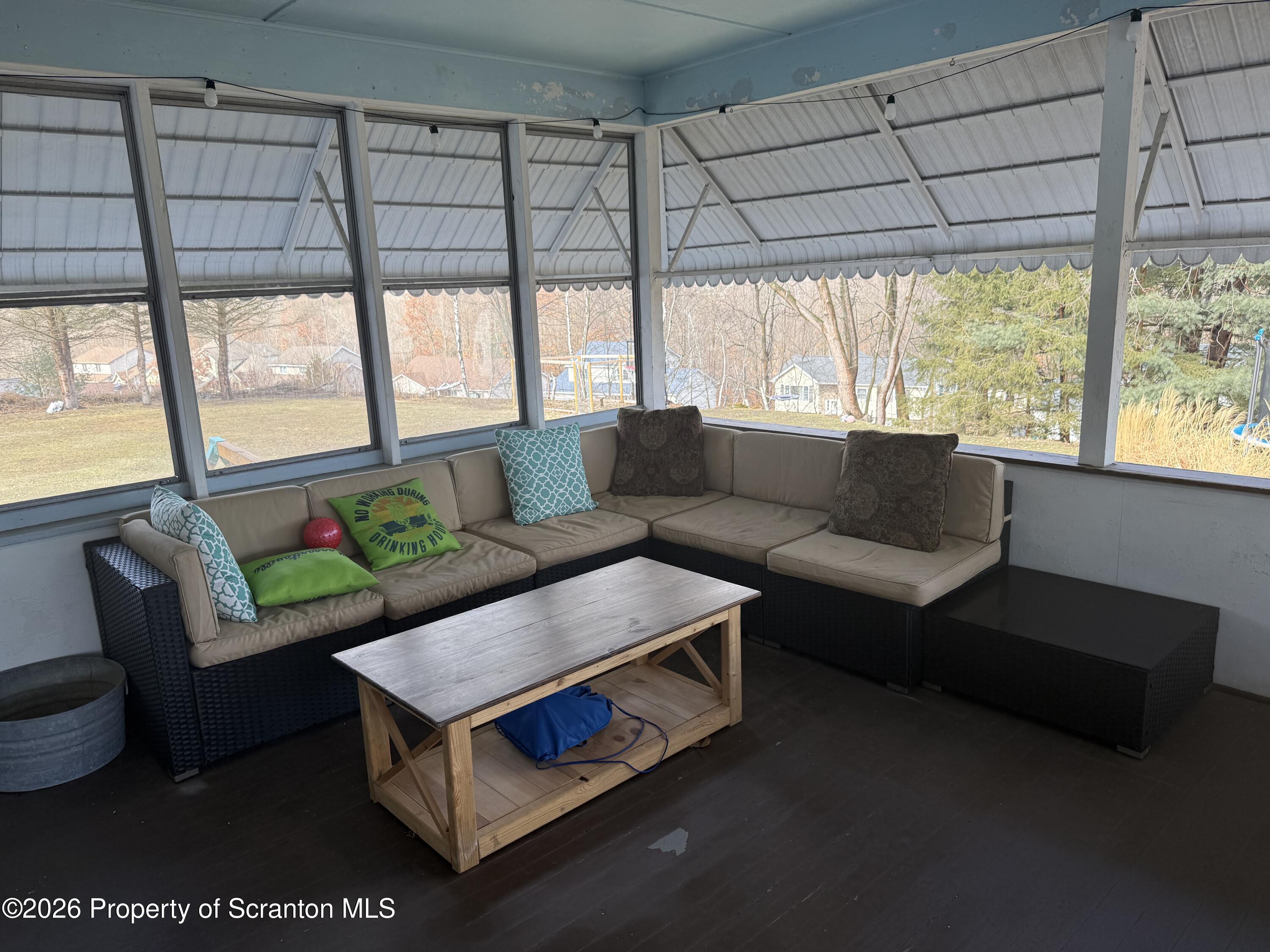 760 North Valley Avenue Olyphant, PA 18447 - Photo 12 of 34 a living room with furniture and a large window