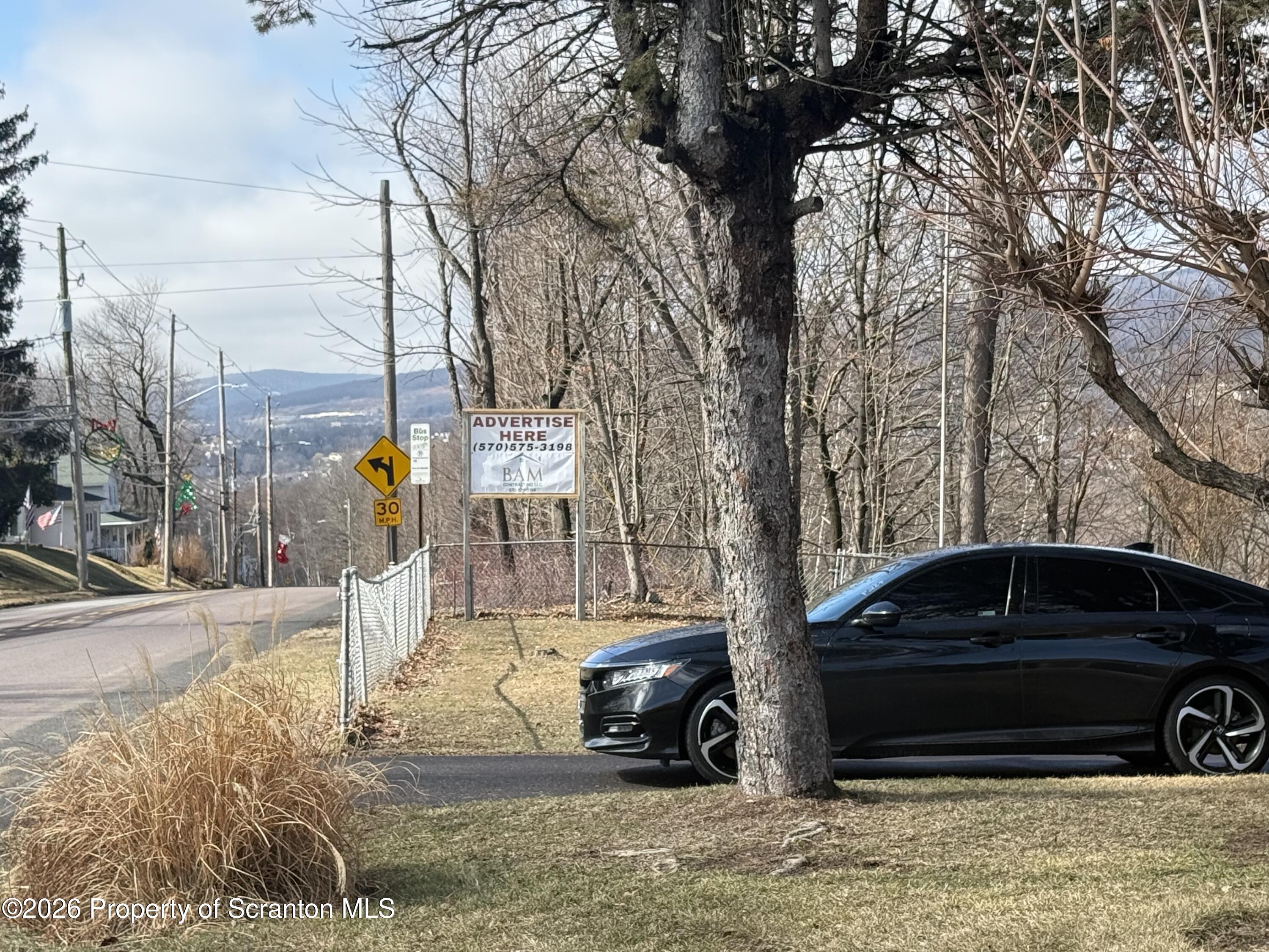 760 North Valley Avenue Olyphant, PA 18447 - Photo 24 of 34 a view of a car parked in front of a house
