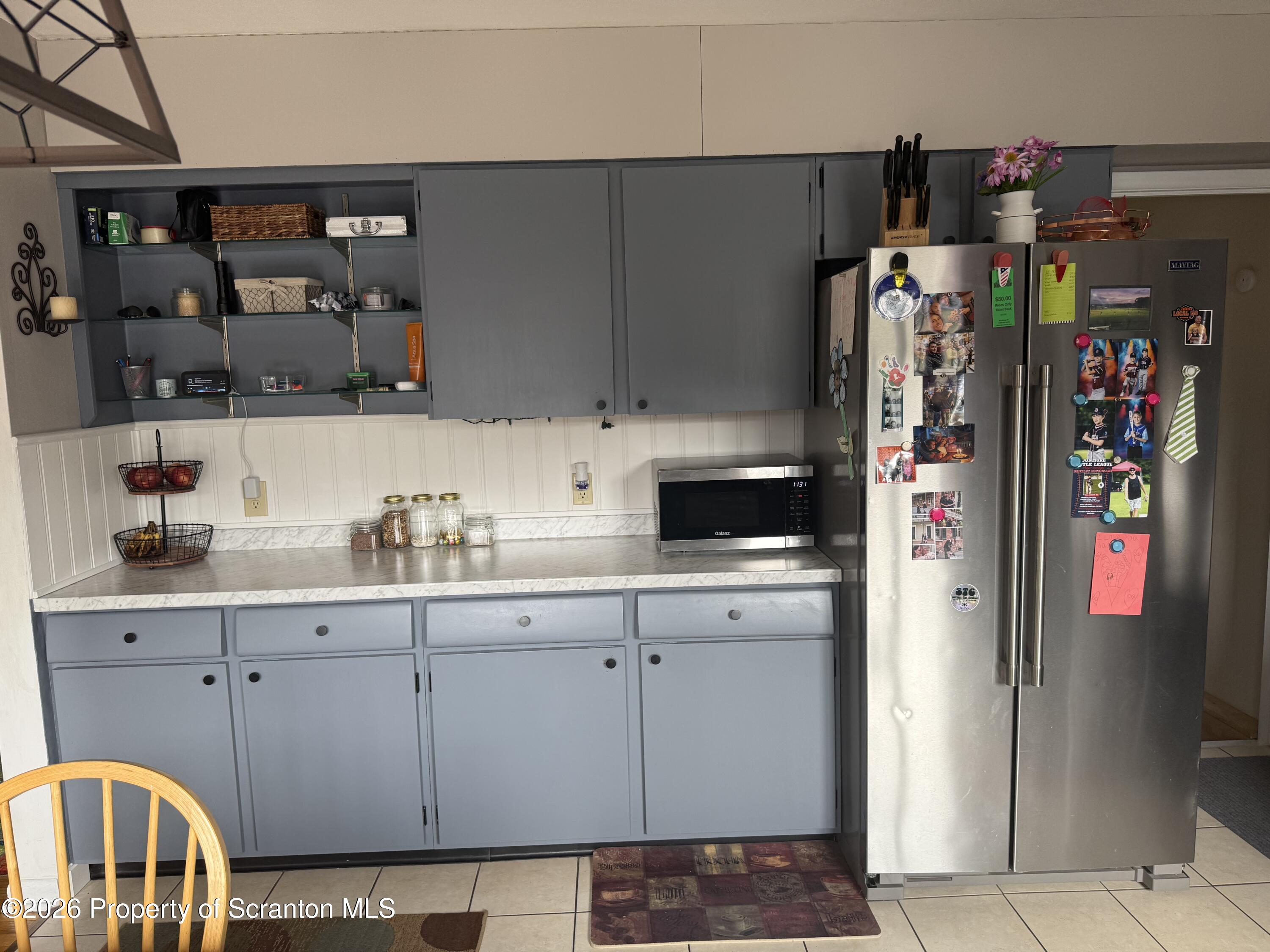 760 North Valley Avenue Olyphant, PA 18447 - Photo 5 of 34 a kitchen with stainless steel appliances granite countertop a refrigerator and a sink