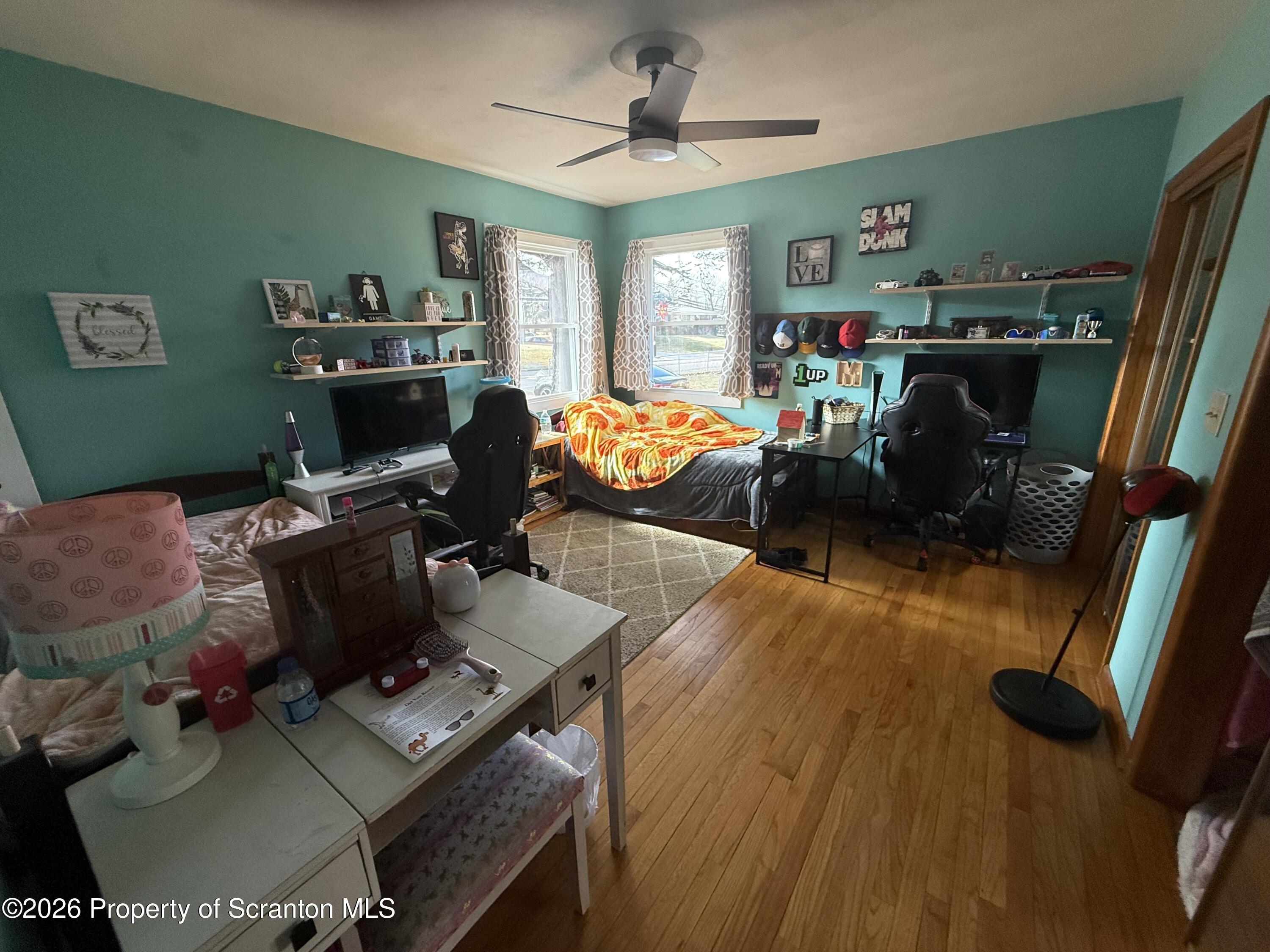 760 North Valley Avenue Olyphant, PA 18447 - Photo 6 of 34 a workspace with furniture and a flat screen tv