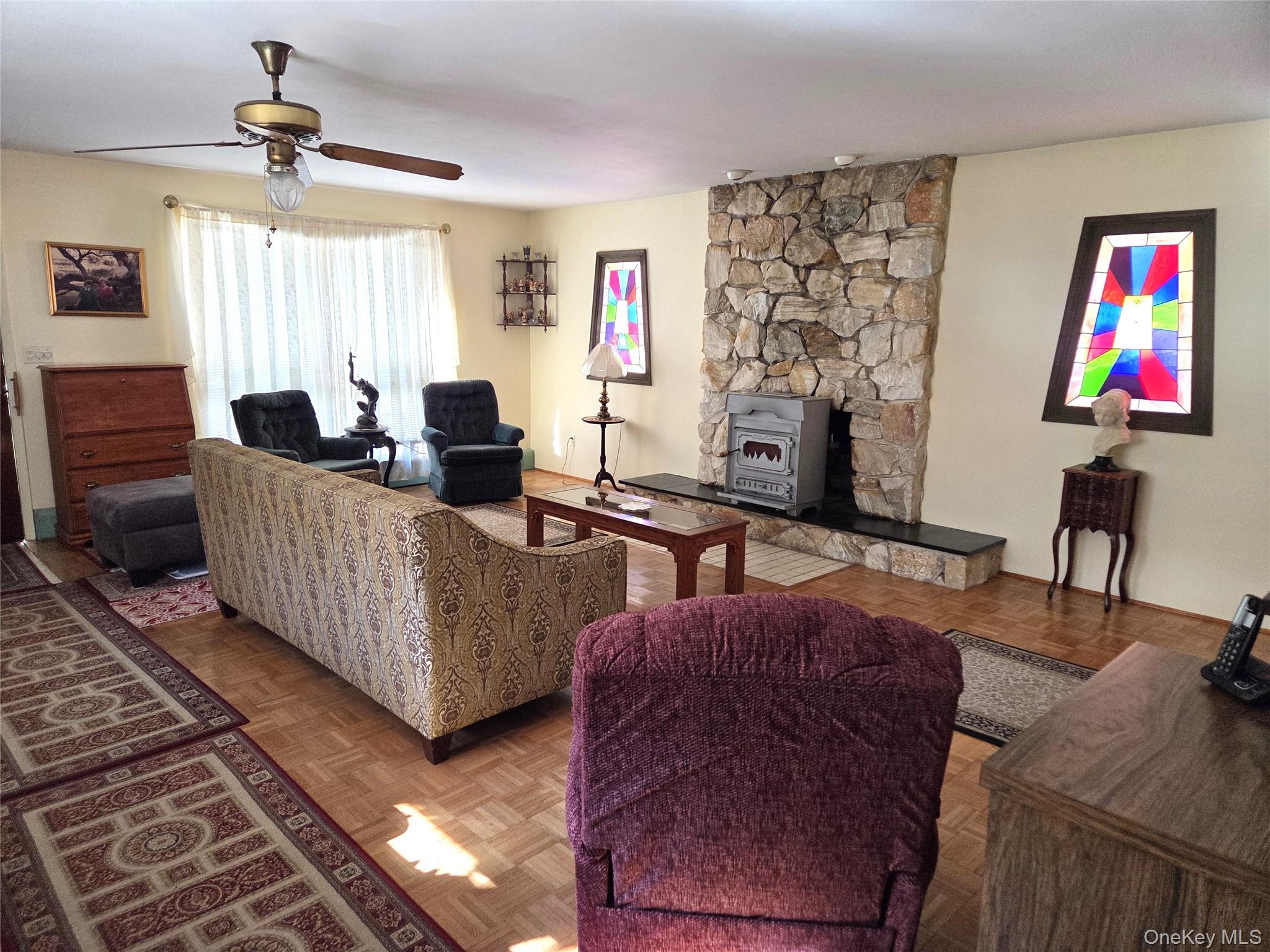 22 Hill Road St. James, NY 11780 - Photo 6 of 13 a living room with furniture and wooden floor