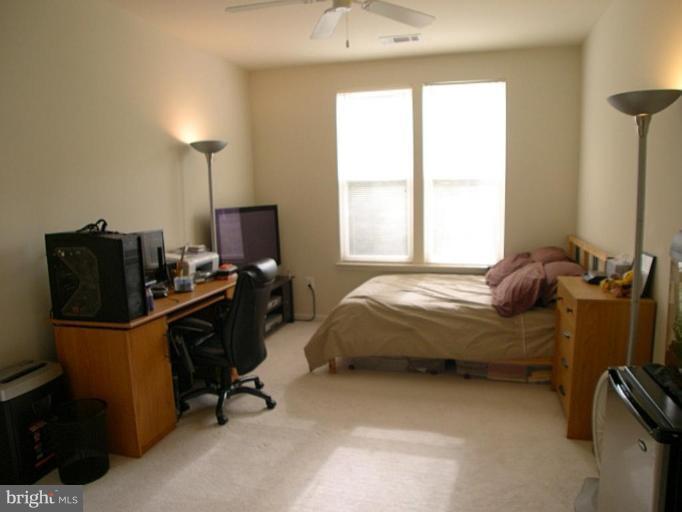 12001 Market Street, Unit 277 Reston, VA 20190 - Photo 13 of 23 Master Bedroom