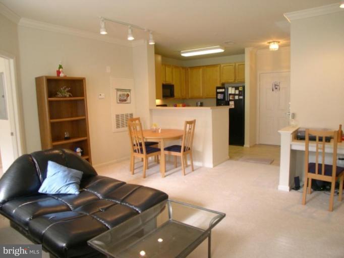 12001 Market Street, Unit 277 Reston, VA 20190 - Photo 8 of 23 Living Room/Dining Room