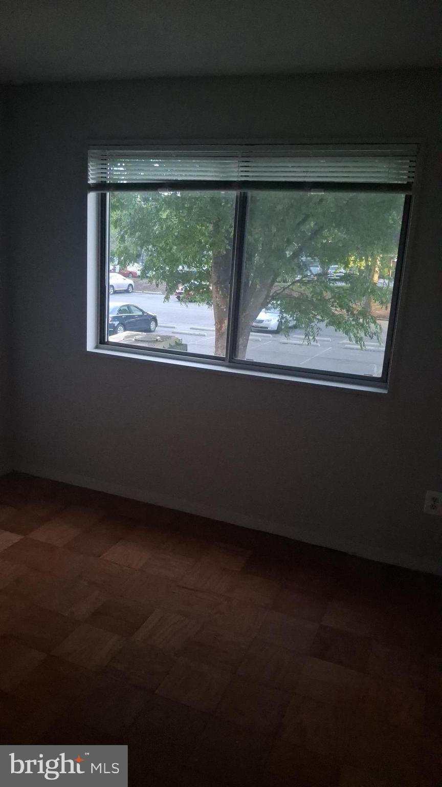 1836 Metzerott Road, Unit 222 Hyattsville, MD 20783 - Photo 3 of 9 a view of a room that has a window in it