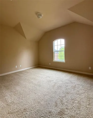 a spacious bathroom with a double vanity sink a mirror and a shower