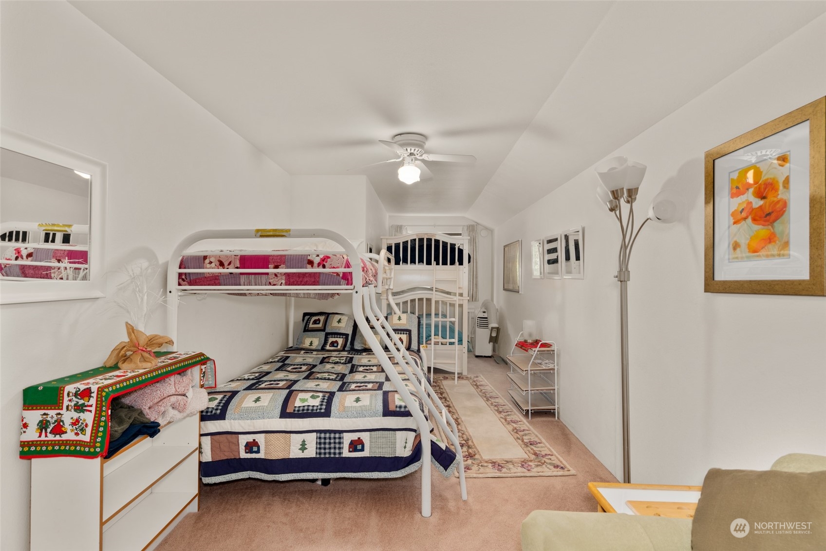 325 Division Street, Unit C Leavenworth, WA 98826 - Photo 24 of 25 a storage room with furniture and a ceiling fan