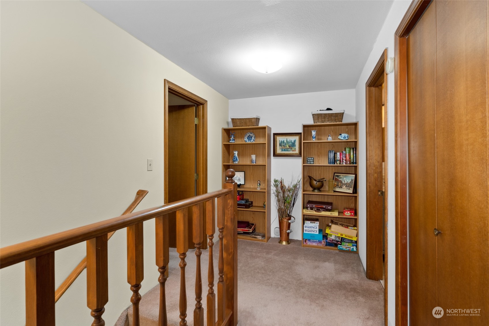 325 Division Street, Unit C Leavenworth, WA 98826 - Photo 25 of 25 a view of a hallway with wooden shelves