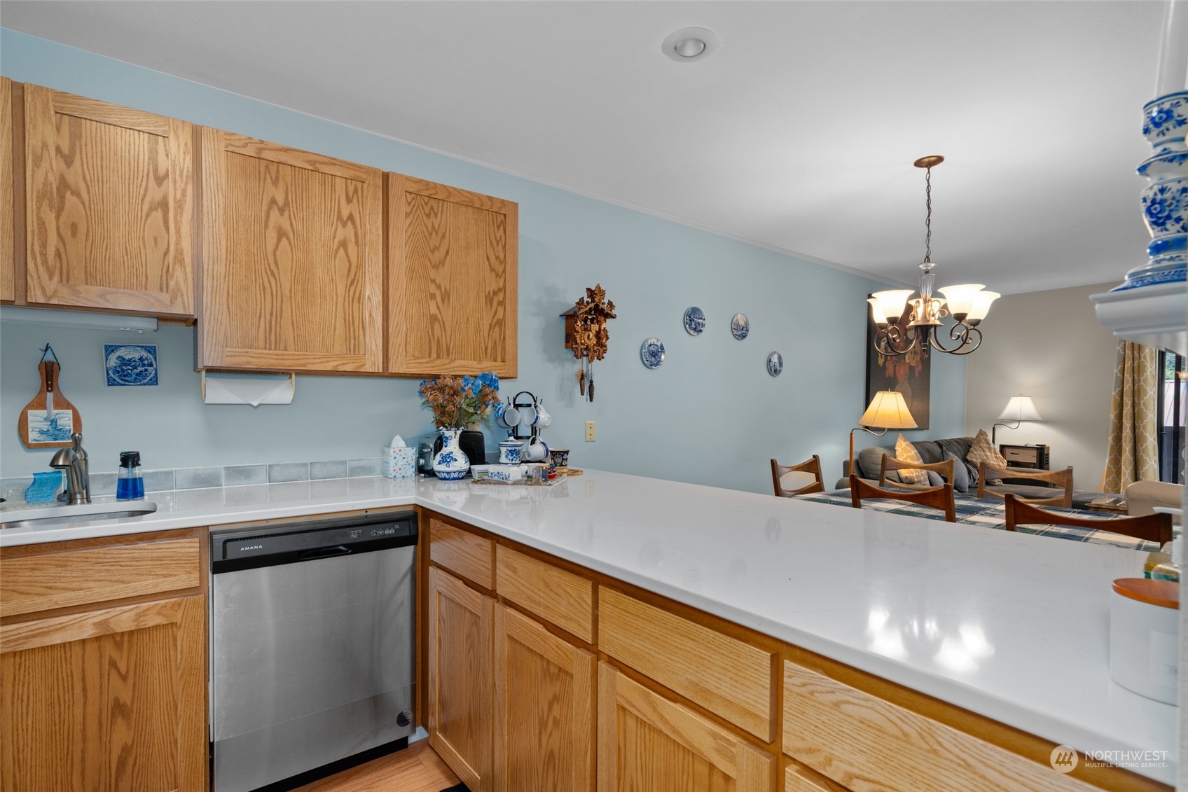 325 Division Street, Unit C Leavenworth, WA 98826 - Photo 9 of 25 a kitchen with a sink cabinets and wooden floor