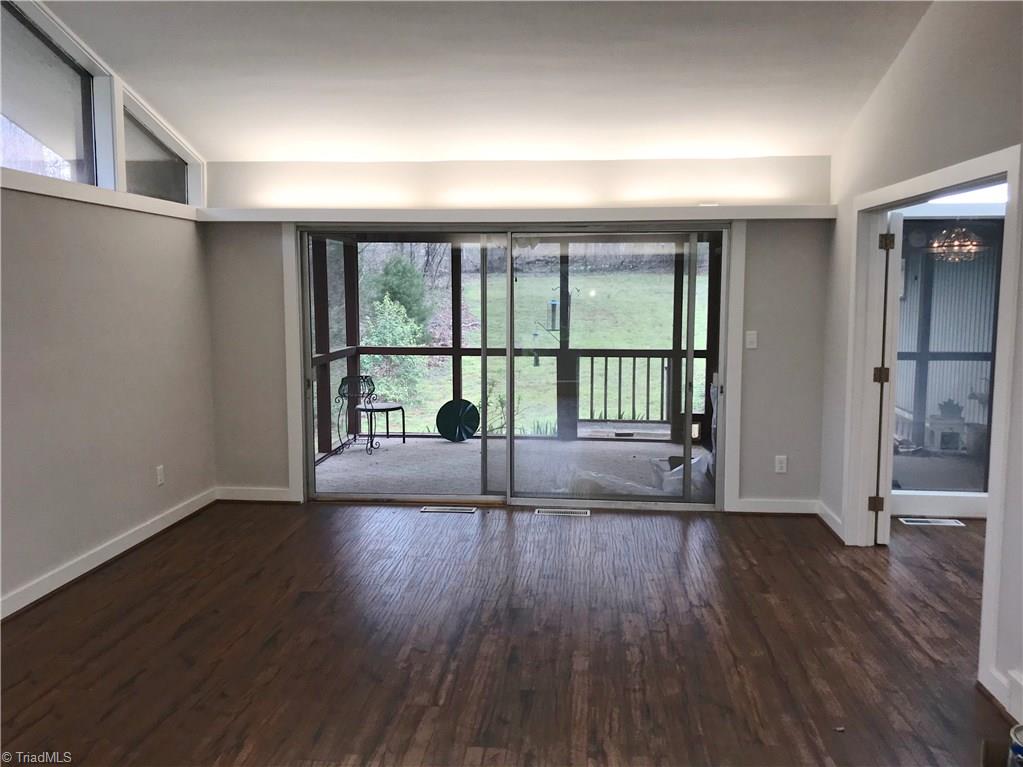 177 Ruffin Street Cooleemee, NC 27014 - Photo 3 of 21 Spacious Living Area with Access to Screened Porch